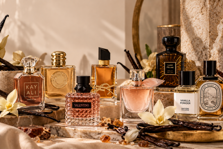 Luxury vanilla perfumes with vanilla pods and white orchids